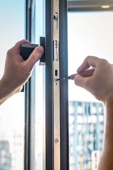 AdobeStock_1436204954 Glass Window Hardware Repair